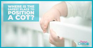 Where is the safest place to position a cot?